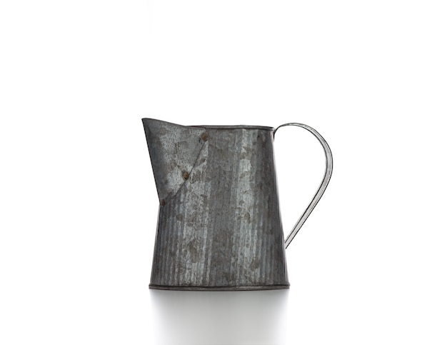 vintage zinc jug on white