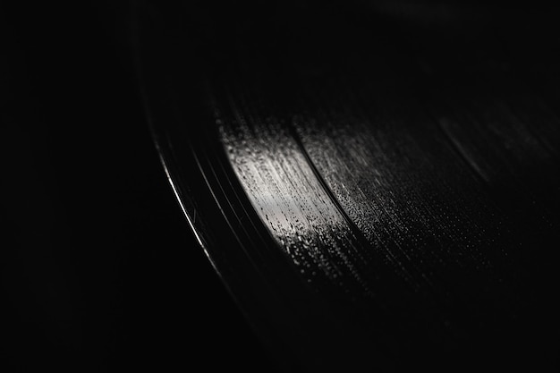 Vinyl record on a black background macro photo