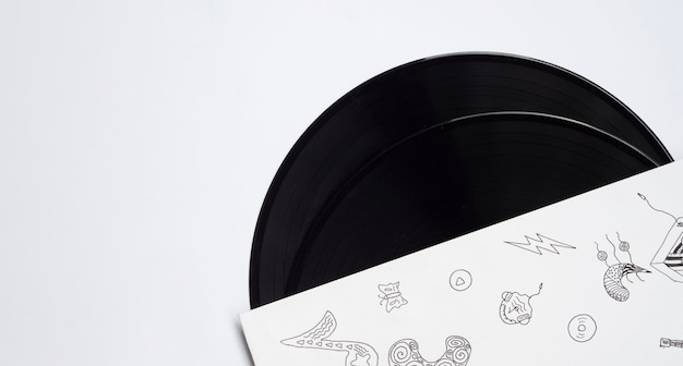 Photo vinyl records on white background with copy-space