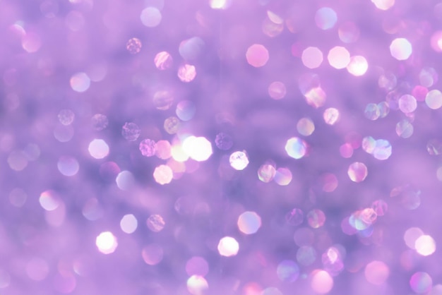 Photo violet blurred background with bokeh lights