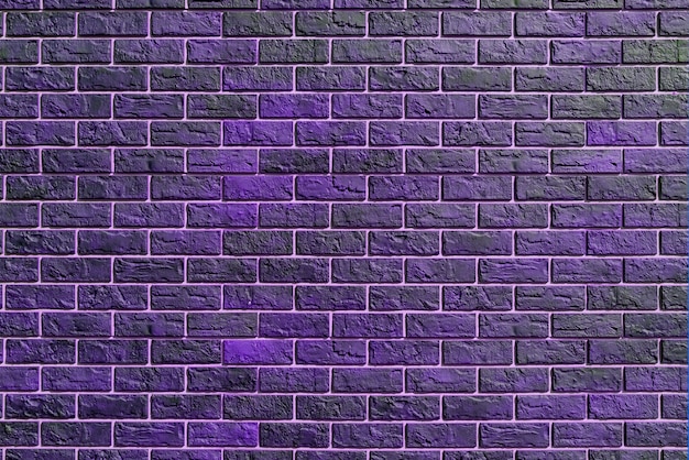 Violet brick wall. Modern construction industry. Building's facade.