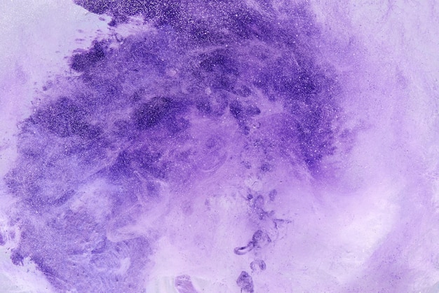 Violet lilac liquid abstract art background. Splashes and stains of paint, emotional concept