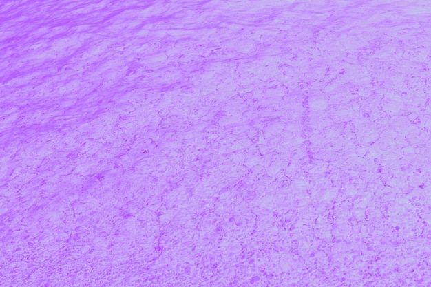 Violet purple patchy abstract background with water glare pattern