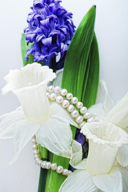 Violet and white flowers wity pearls