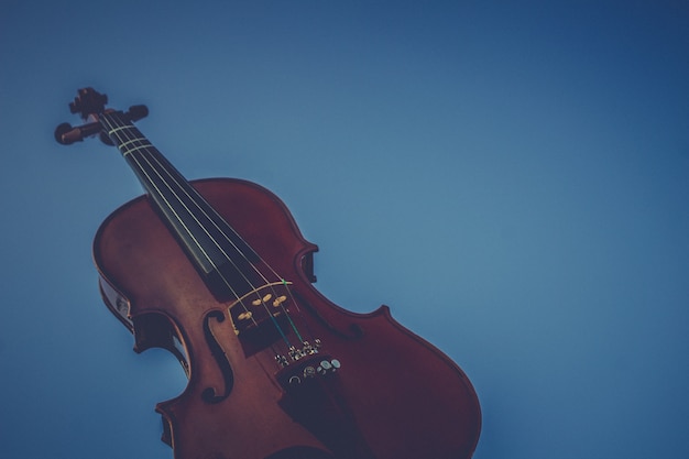 A violin on a blue background