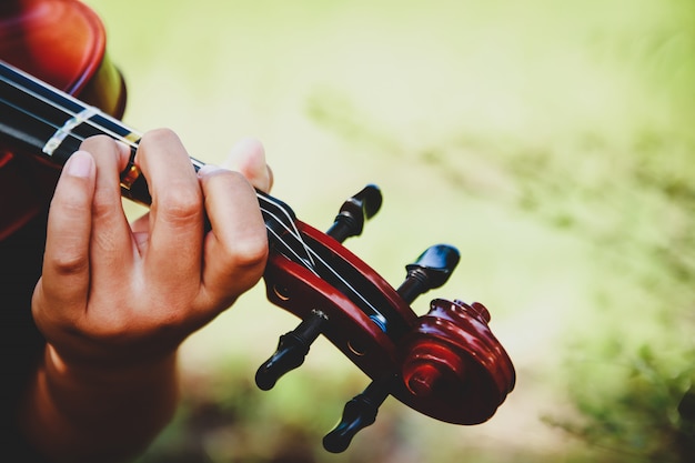 Violin boy handles Practice playing skillfully.