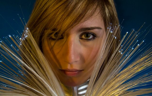 Virtual.Fiber Optic concept, woman with modern lights