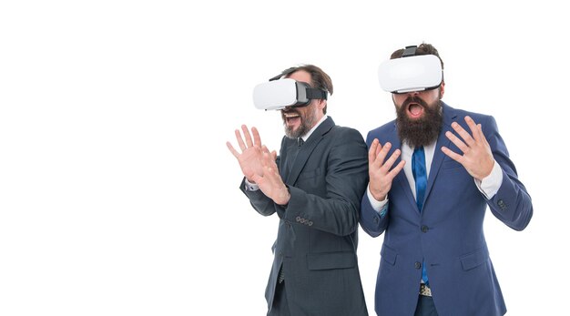 Virtual reality Partnership and teamwork Digital future and innovation businessmen wear VR glasses mature men with beard in suit modern technology in agile business Another reality is here