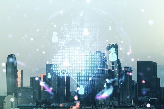 Virtual social network hologram and world map on Los Angeles skyline background. Multiexposure