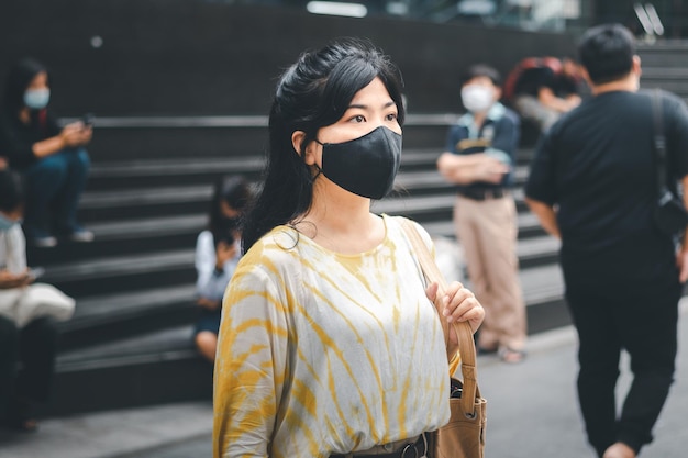 virus mask asian woman wearing a mask to prevent the coronavirus virus