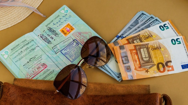 Visas with money and sunglasses