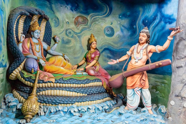 Foto vishnu e lakshmi riposano sul serpente ananta shesha