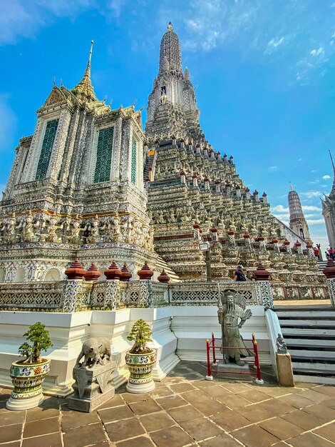 The visiting card of the capital of Thailand is the Buddhist temple Wat Arun Temple of Dawn which is located on the banks of the Chao Phraya River