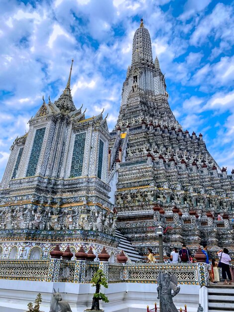 The visiting card of the capital of Thailand is the Buddhist temple Wat Arun Temple of Dawn which is located on the banks of the Chao Phraya River