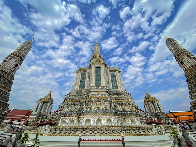 The visiting card of the capital of Thailand is the Buddhist temple Wat Arun Temple of Dawn which is located on the banks of the Chao Phraya River
