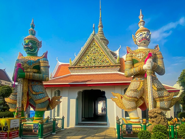 The visiting card of the capital of thailand is the buddhist temple wat arun temple of dawn which is located on the banks of the chao phraya river