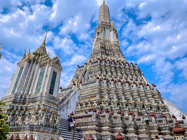 The visiting card of the capital of Thailand is the Buddhist temple Wat Arun Temple of Dawn which is located on the banks of the Chao Phraya River