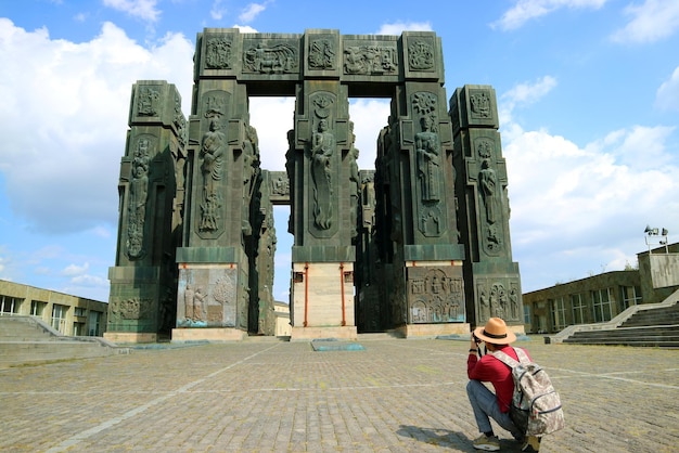 Visitor Photographing the Chronicle of Georgia Located near Tbilisi City Georgia