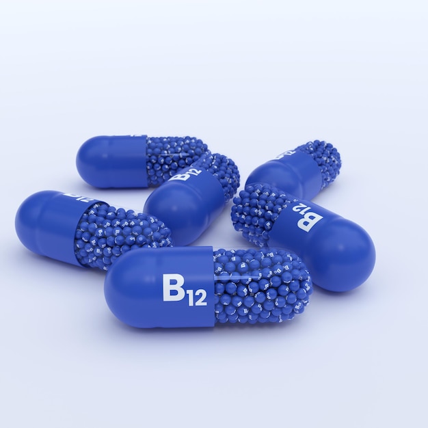 Photo vitamin b12 blue capsules granules and whtie background