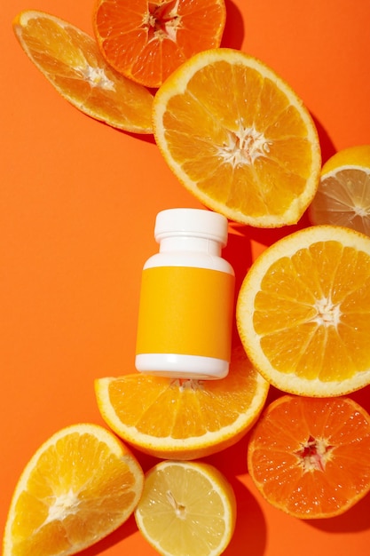 Vitamin C biosupplement bottle on a light background