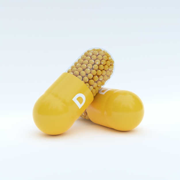 Vitamin D With Yellow Capsule Granules and White Background