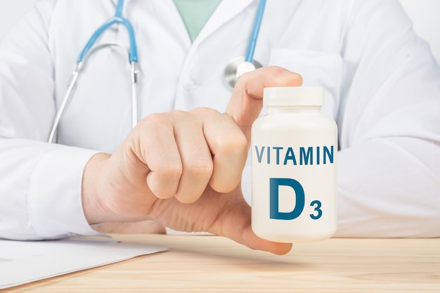 Vitamin D3 and supplements for human health. Doctor recommends taking vitamin D3. doctor talks about Benefits of vitamin D3. Essential vitamins and minerals for humans. D3 Vitamin Health Concept.