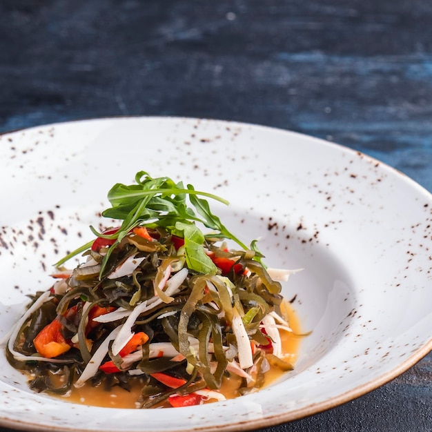 Vitamin salad with sea cabbage Closeup