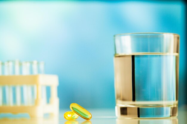 Vitamins supplements, fish oil in yellow capsules omega 3.