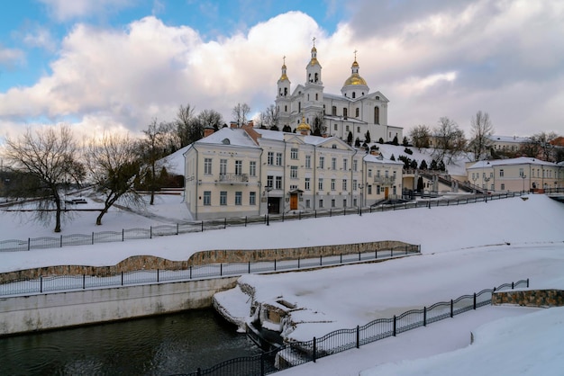 Vitba River Holy Spirit Convent and Holy Assumption Cathedral on a winter day Vitebsk Belarus