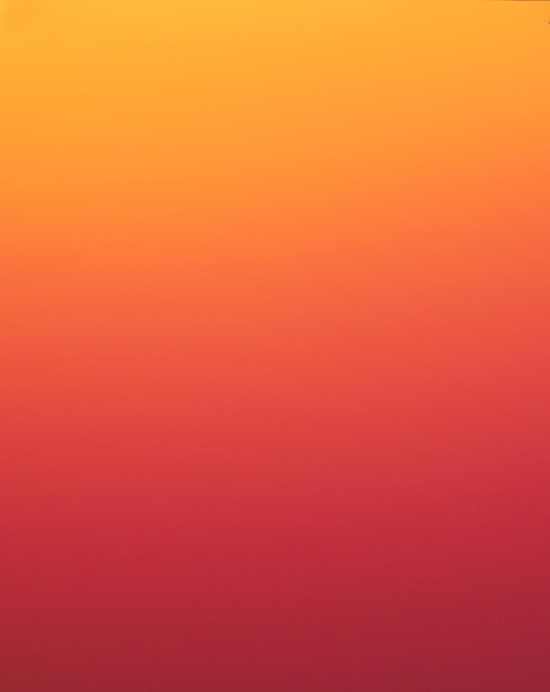 Vivid blurred colorful orange and yellow wallpaper background