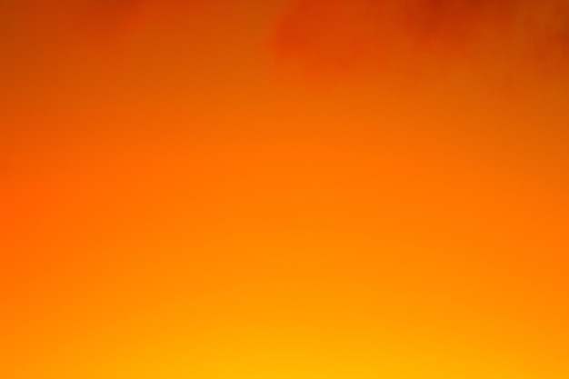 Vivid blurred colorful orange and yellow wallpaper background