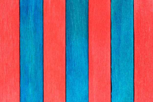 Vivid colorful red and blue wood planks texture or background