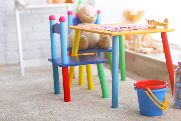 Фото Яркая детская комната с игрушками