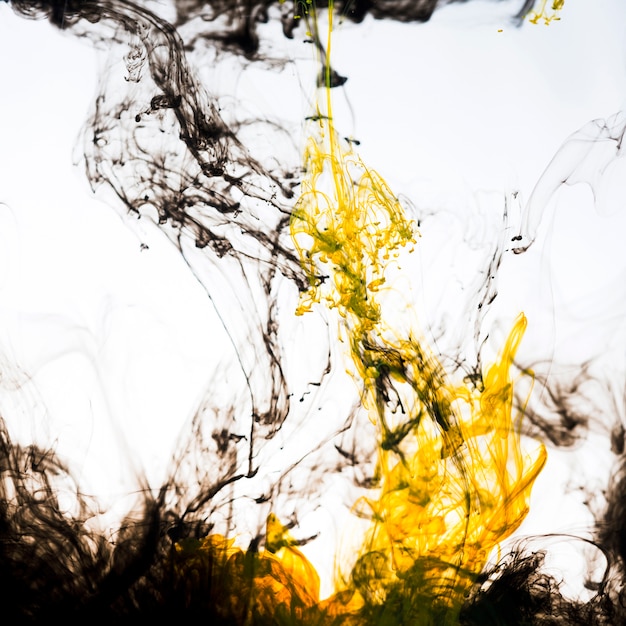 Photo vivid mixture of flowing inks underwater