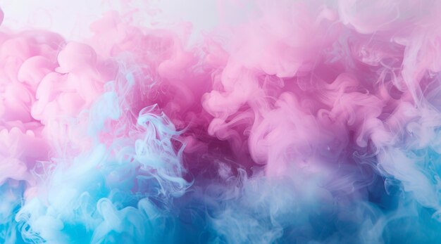 Vivid pink and blue smoke intertwine in a dynamic and flowing motion creating a soft dreamy background ideal for artistic designs