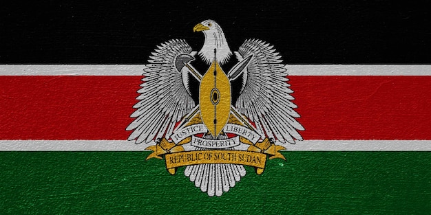 Vlag en wapenschild van de Republiek Zuid-Soedan op een gestructureerde achtergrond Concept collage