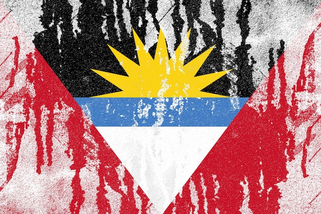 Vlag van Antigua en Barbuda geschilderd op oude noodlijdende betonnen muur achtergrond