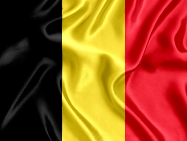 Vlag van België zijde close-up achtergrond