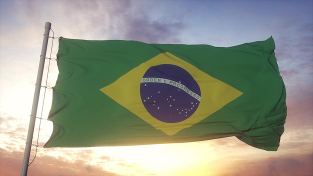 Foto vlag van brazilië zwaaien in de wind tegen diepe mooie hemel. 3d-rendering.