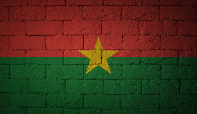 Vlag van de Burkina Faso op grunge muur achtergrond. Originele verhoudingen