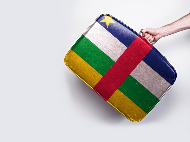 Vlag van de Centraal-Afrikaanse Republiek op een vintage leren koffer