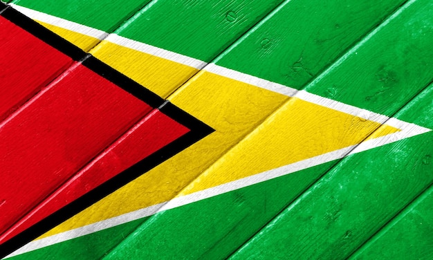 Vlag van de Coöperatieve Republiek Guyana op een gestructureerde achtergrond Concept collage