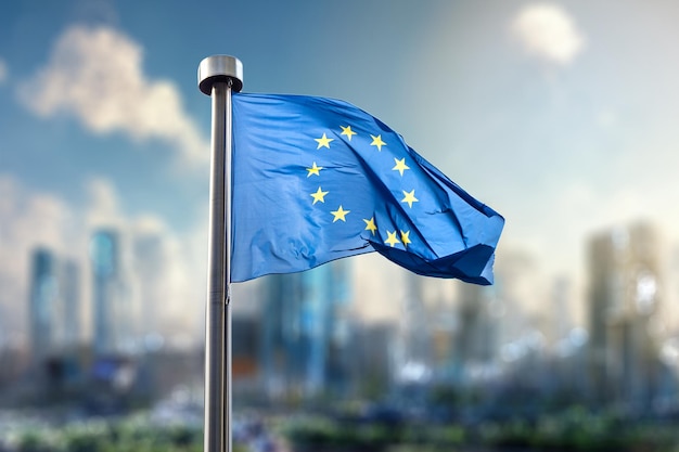 Foto vlag van de europese unie tegen van de moderne stad