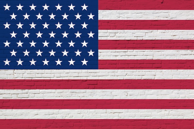 Vlag van de VS de nationale die Amerika op bakstenen muur wordt geschilderd