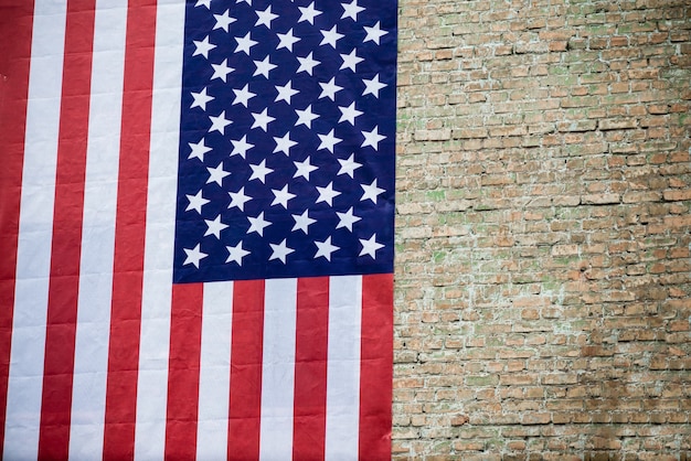 Vlag van de VS op bakstenen muur textuur