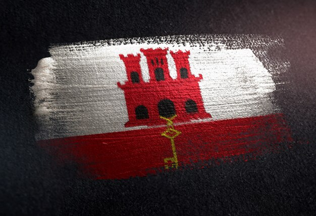 Vlag van Gibraltar gemaakt van metallic penseel verf op grunge donkere muur