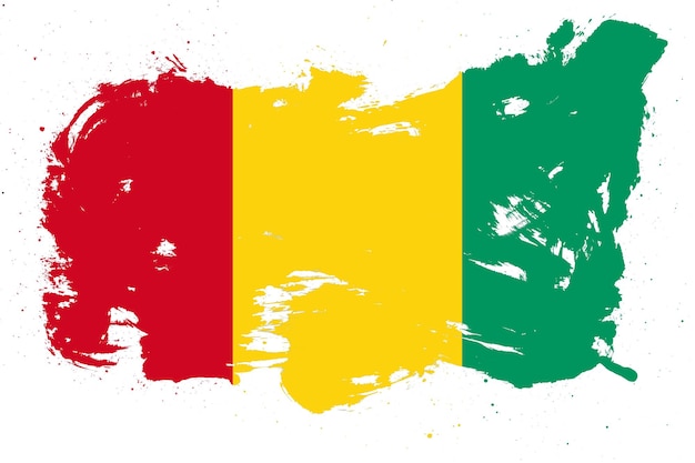 Vlag van Guinee met geschilderd grunge penseelstreekeffect op witte achtergrond