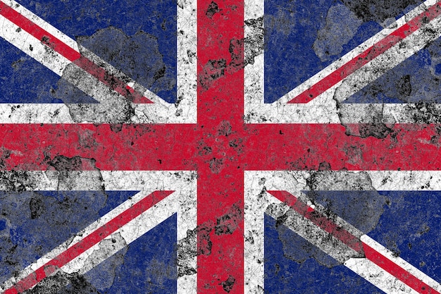 Vlag van het Verenigd Koninkrijk op een beschadigd oud betonnen muuroppervlak