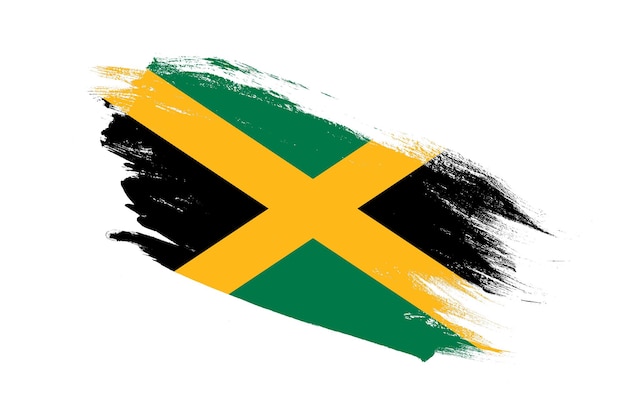 Vlag van Jamaica met slagpenseel geschilderde effecten op geïsoleerde witte achtergrond