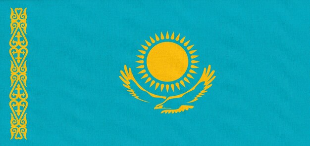 vlag van Kazachstan Nationale Kazachse vlag op stofoppervlak Kazachse nationale vlag op gestructureerde achtergrond Stof Textuur Republiek Kazachstan Aziatisch land Staatssymbool van Kazakstan